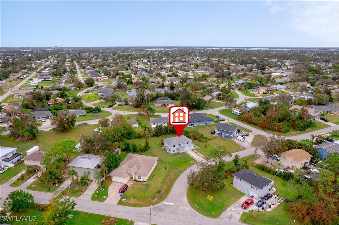 8025 Anhinga Road Fort Myers, FL 33967 - Photo 38 of 47 an aerial view of residential houses with outdoor space