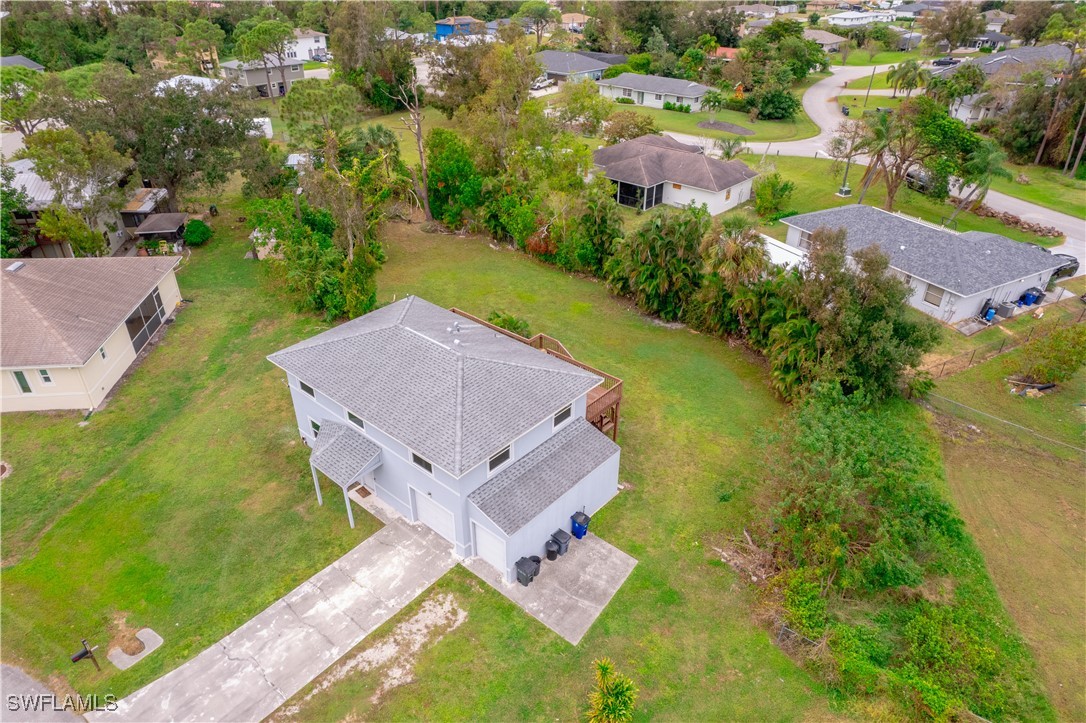 8025 Anhinga Road Fort Myers, FL 33967 - Photo 46 of 47 an aerial view of a house with a garden