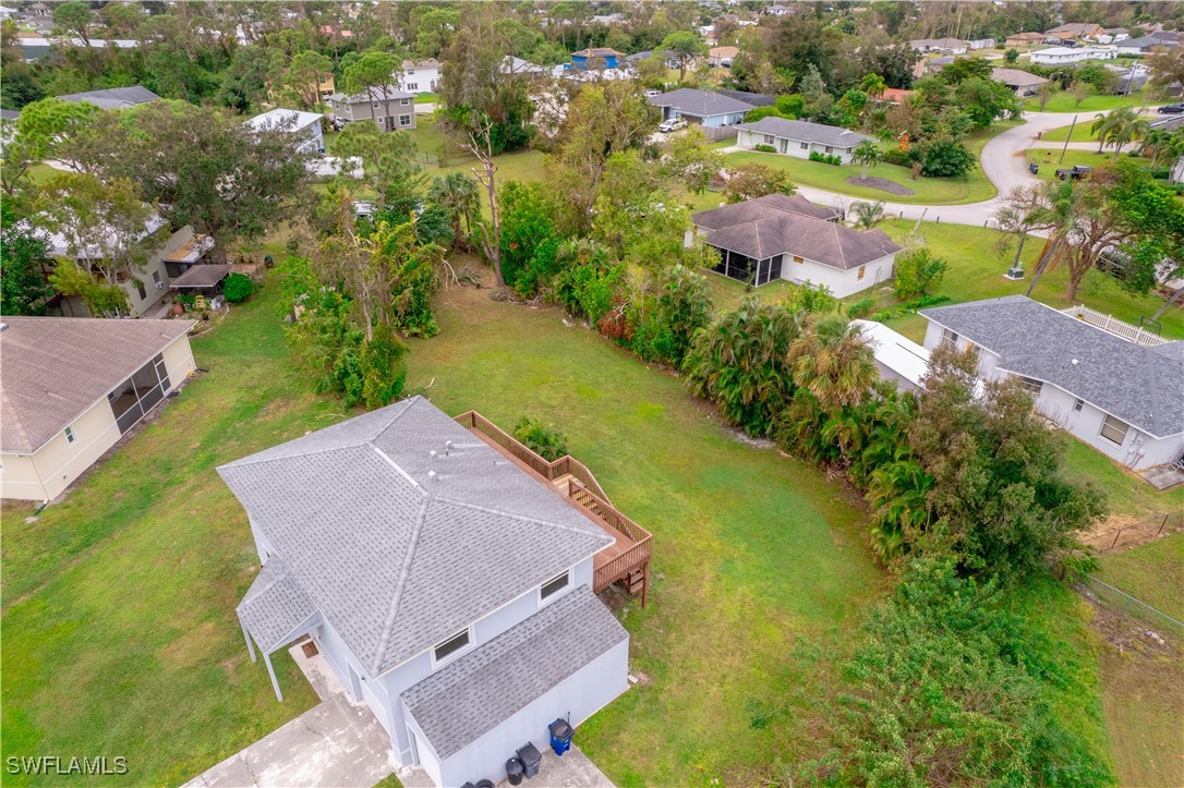 8025 Anhinga Road Fort Myers, FL 33967 - Photo 47 of 47 an aerial view of residential house with outdoor space and swimming pool