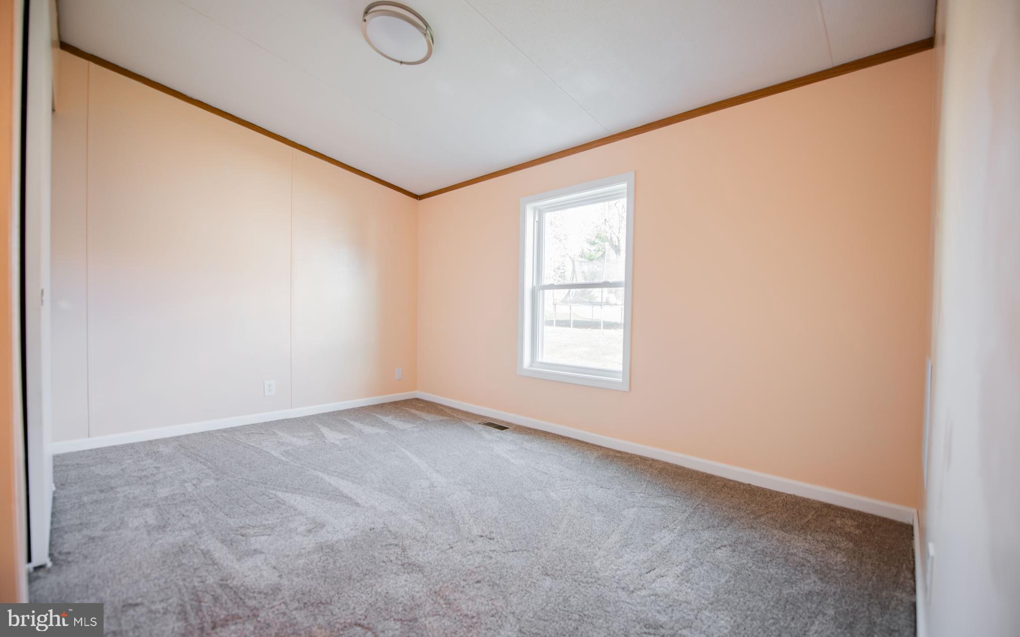 937 Center Street Lock Haven, PA 17745 - Photo 8 of 20 an empty room with windows