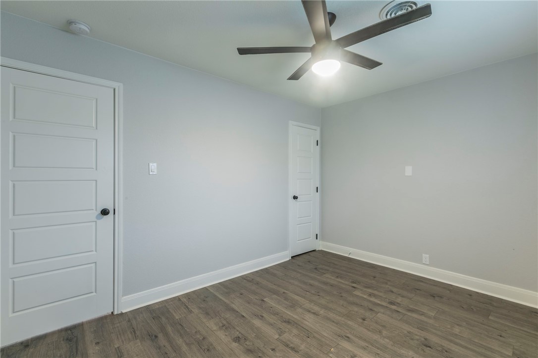 105 Alamo Drive McGregor, TX 76657 - Photo 25 of 34 wooden floor in an empty room