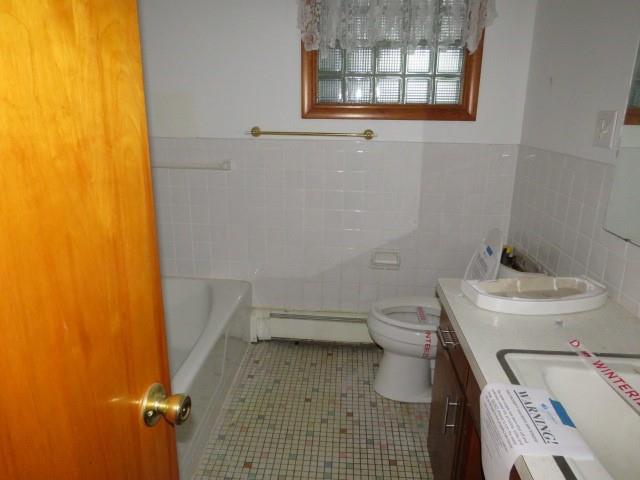 120 Virginia Street Latrobe, PA 15650 - Photo 18 of 31 a bathroom with a sink a toilet and a shower