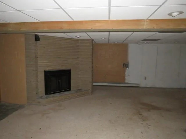 a view of empty room with windows