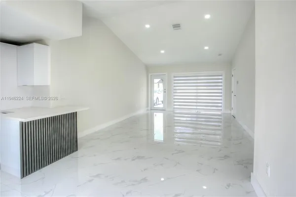 a view of hallway with stairs