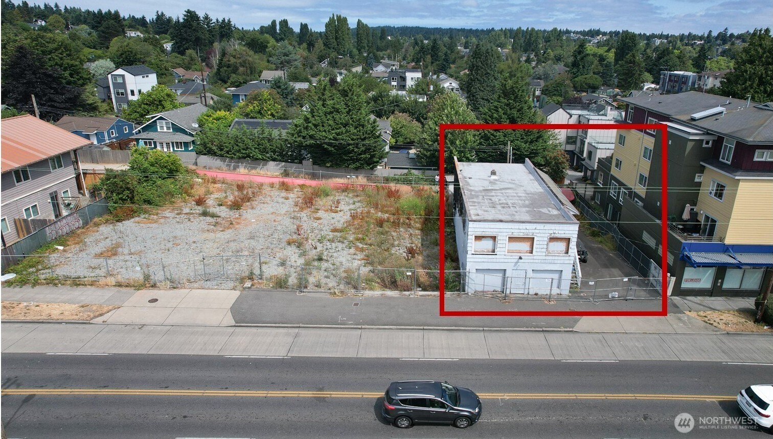 320 Northwest 85th Street Seattle, WA 98117 - Photo 7 of 8 an aerial view of a house with a yard