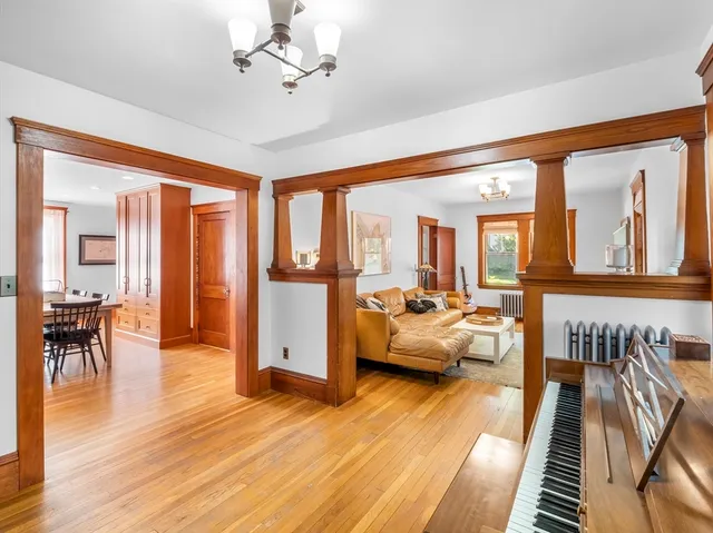 a view of a dining room with furniture and window