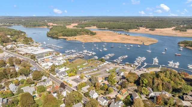 an aerial view of residential building with ocean view