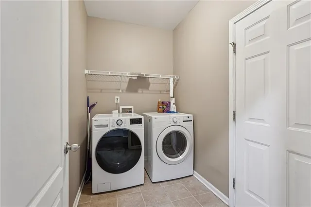 a spacious bedroom with a bed and a window