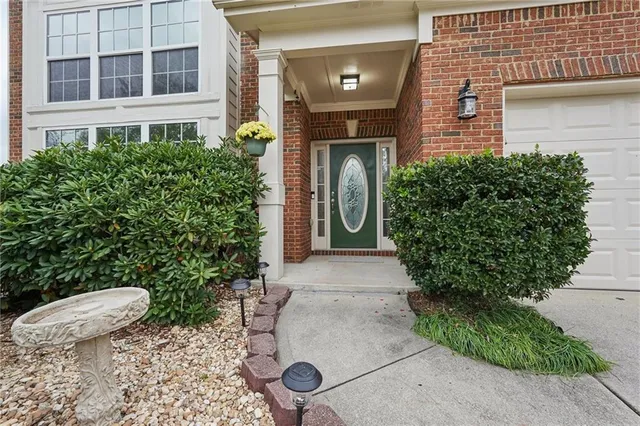 a living room with a couch and a rug