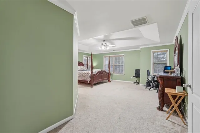 a view of a barn in the middle of a yard