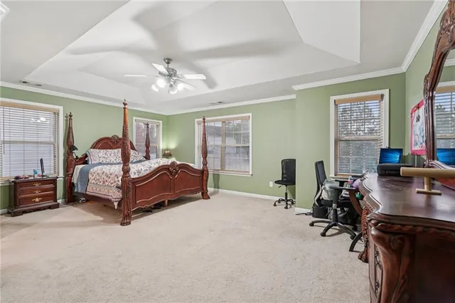 a view of a house with backyard and backyard