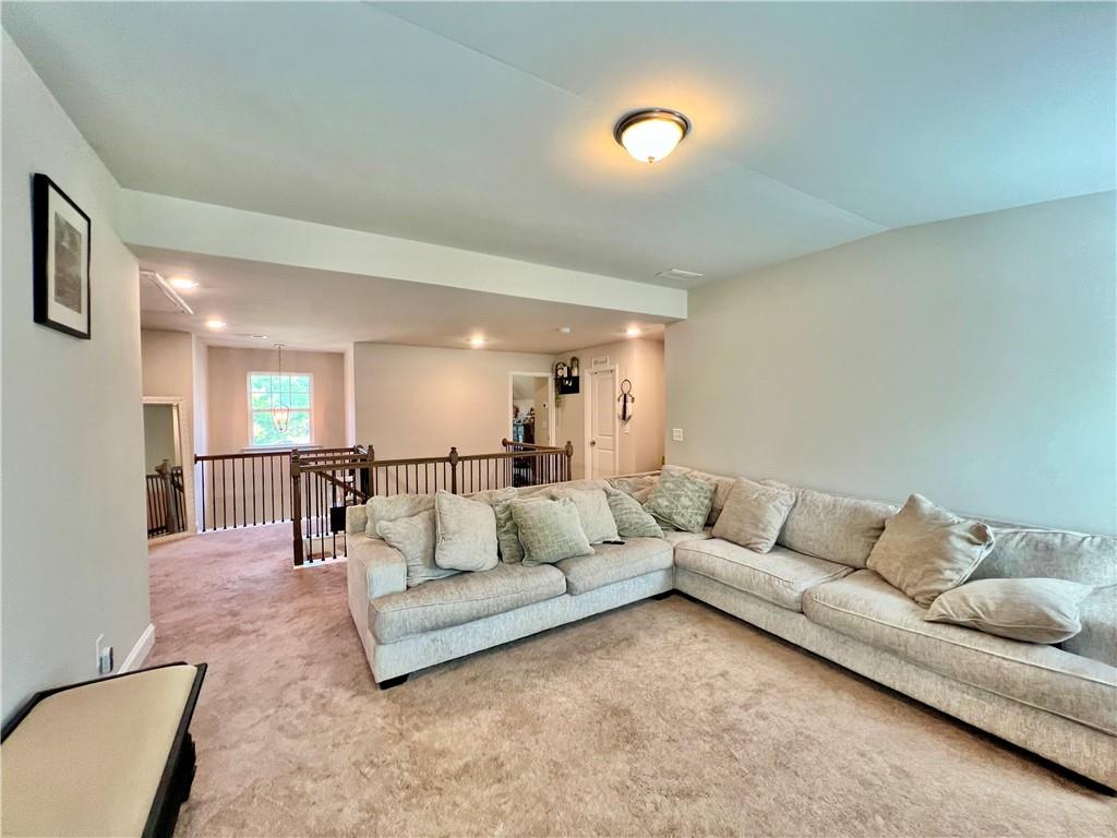 263 Camden Lake Drive Villa Rica, GA 30180 - Photo 18 of 25 a living room with furniture and a couch