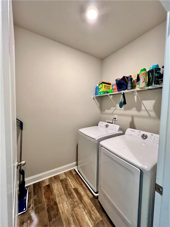 263 Camden Lake Drive Villa Rica, GA 30180 - Photo 2 of 25 a utility room with dryer and washer