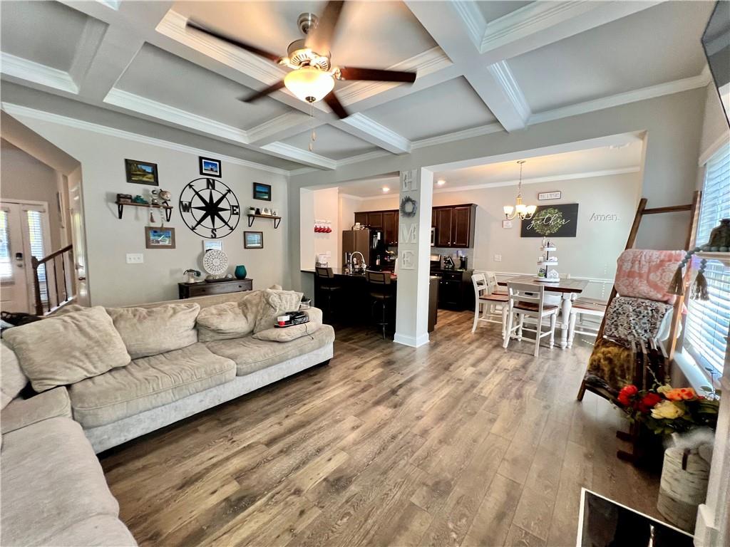 263 Camden Lake Drive Villa Rica, GA 30180 - Photo 5 of 25 a living room with furniture and wooden floor