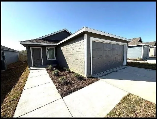 a view of backyard of house