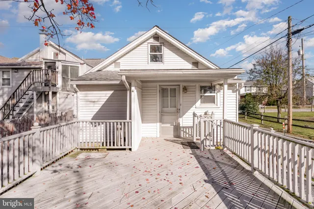 a front view of a house with a porch