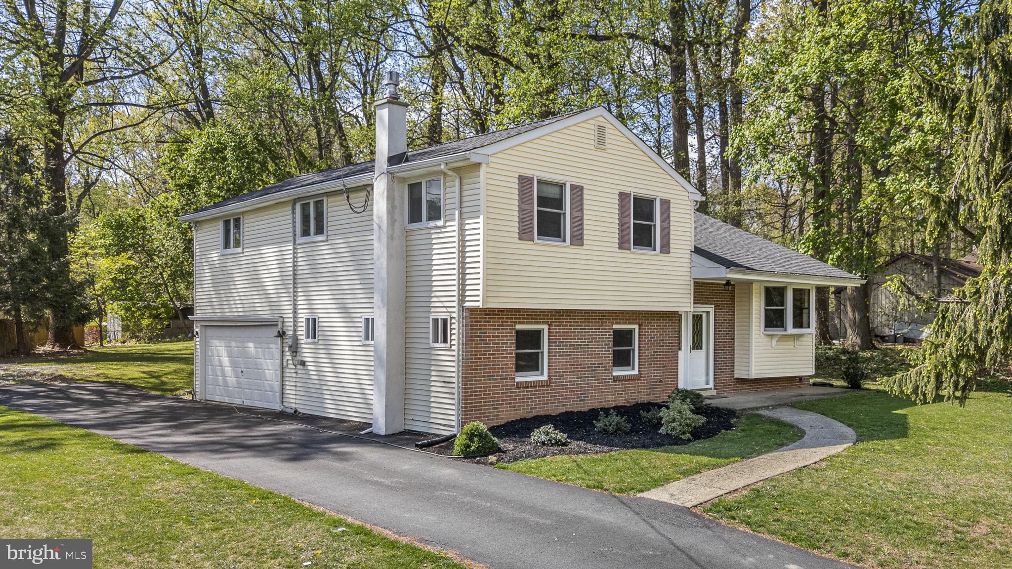 304 Crump Road Exton, PA 19341 - Photo 2 of 30 Charming home nestled in lush greenery.