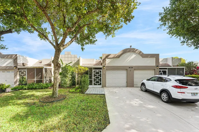 a picture of floor with a white building