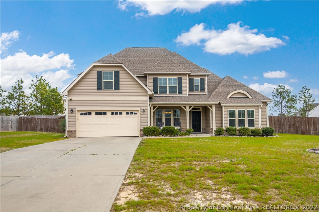 109 Caulfield Road Aberdeen, NC 28315 - Photo 1 of 28 a front view of a house with a yard
