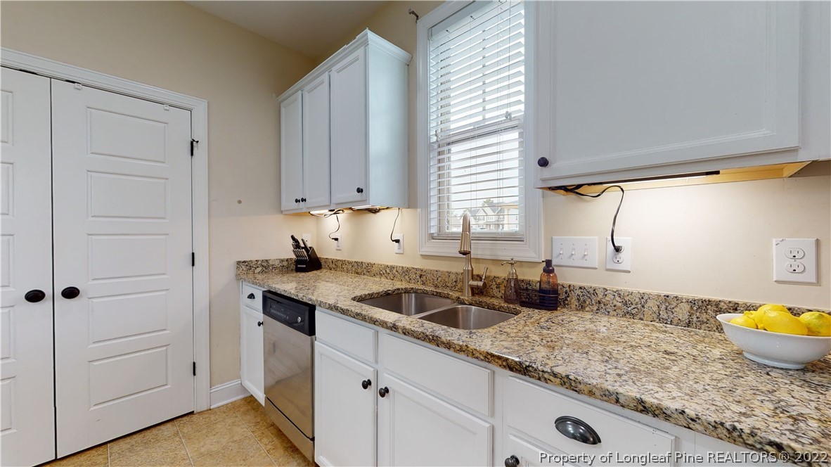 109 Caulfield Road Aberdeen, NC 28315 - Photo 11 of 28 a kitchen with sink and window
