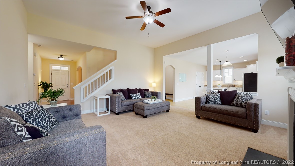 109 Caulfield Road Aberdeen, NC 28315 - Photo 6 of 28 a living room with furniture and a chandelier