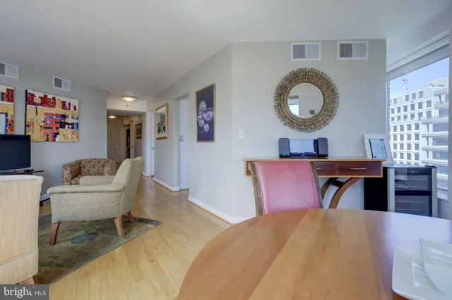 a bedroom with a bed and dresser