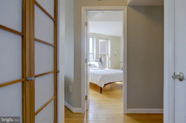 a bathroom with a glass shower door