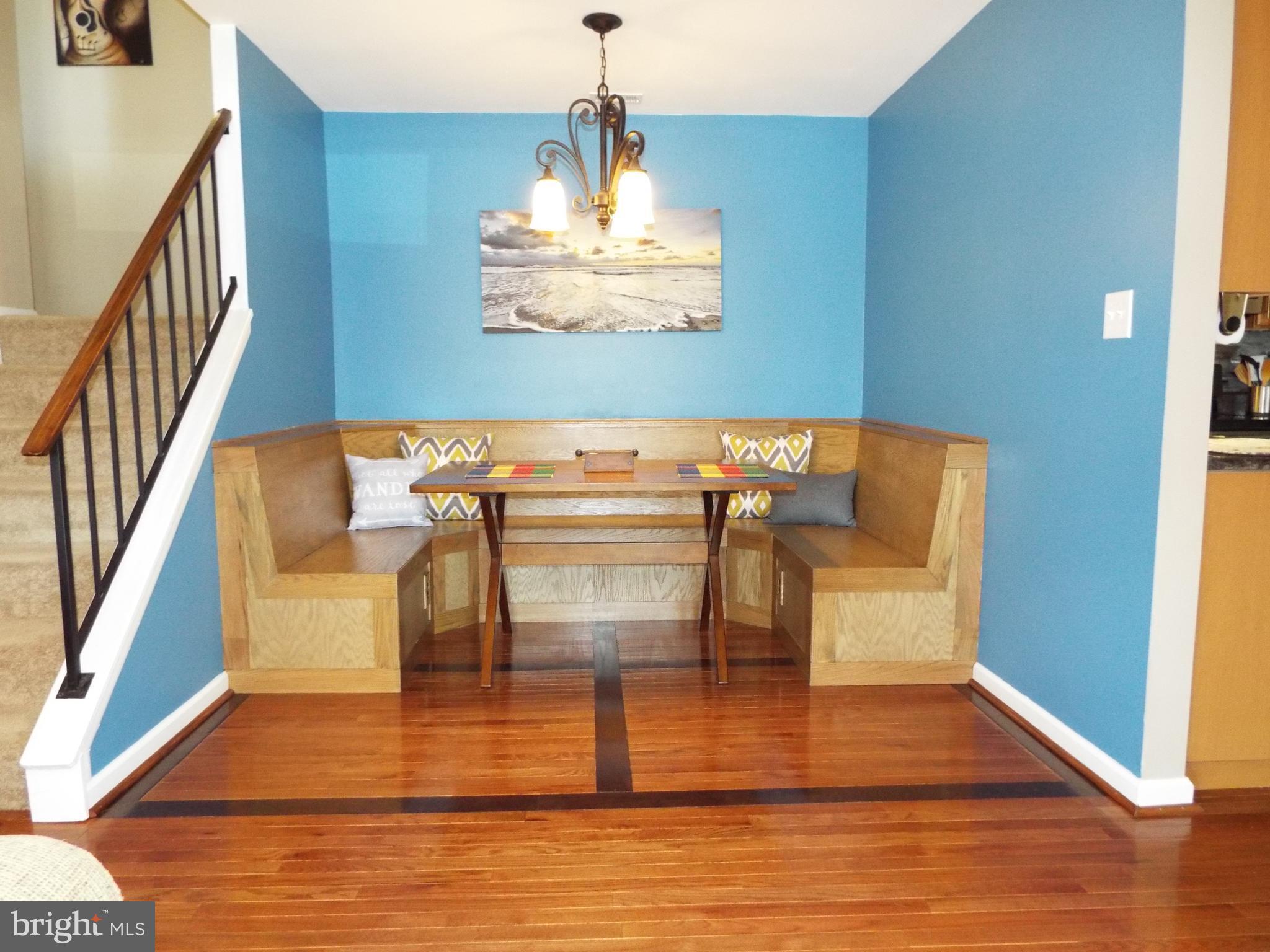 10909 Trotting Ridge Way, Unit 910 Columbia, MD 21044 - Photo 10 of 28 Dining Room/Area Custom Built-in Table