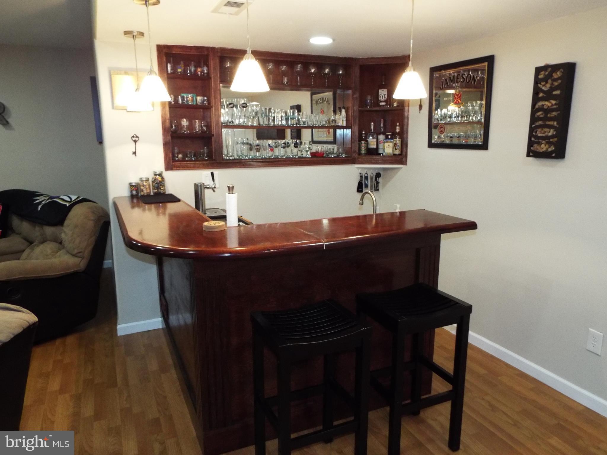 10909 Trotting Ridge Way, Unit 910 Columbia, MD 21044 - Photo 14 of 28 Custom Wet Bar with Kegerator