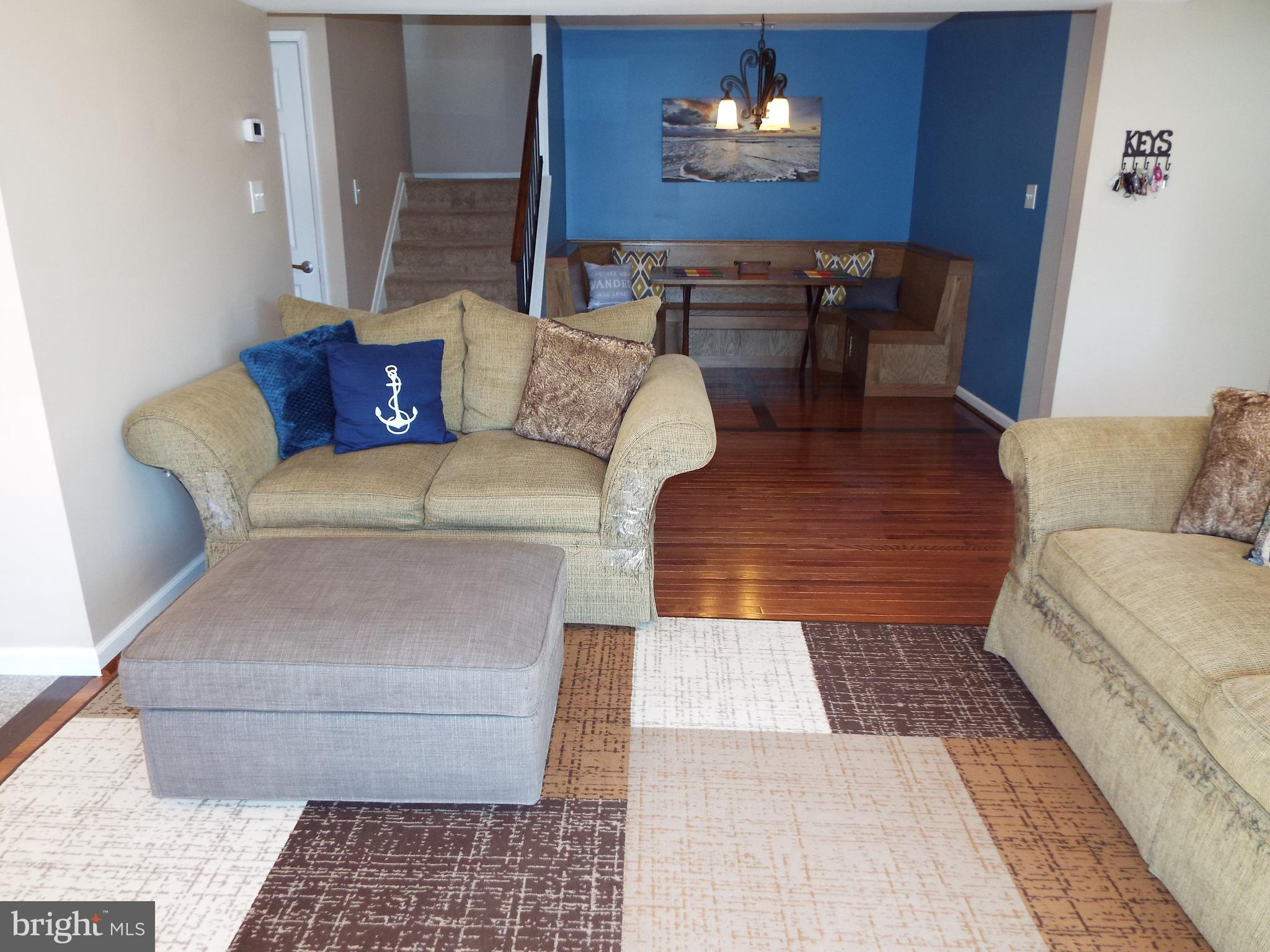 10909 Trotting Ridge Way, Unit 910 Columbia, MD 21044 - Photo 8 of 28 Living to Dining Rooms