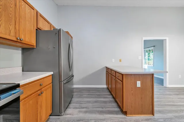 a view of a kitchen from the hallway