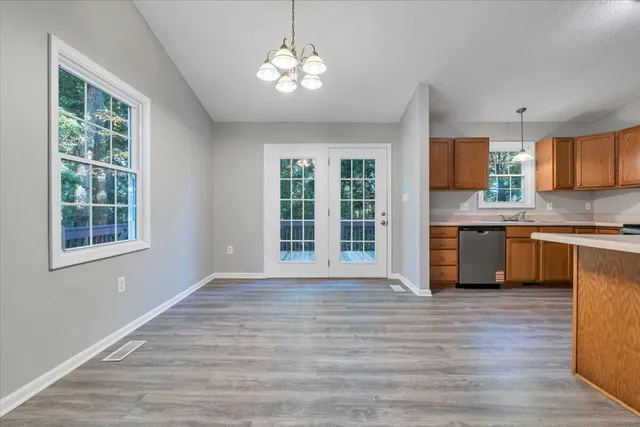 a view of a kitchen with microwave and stove