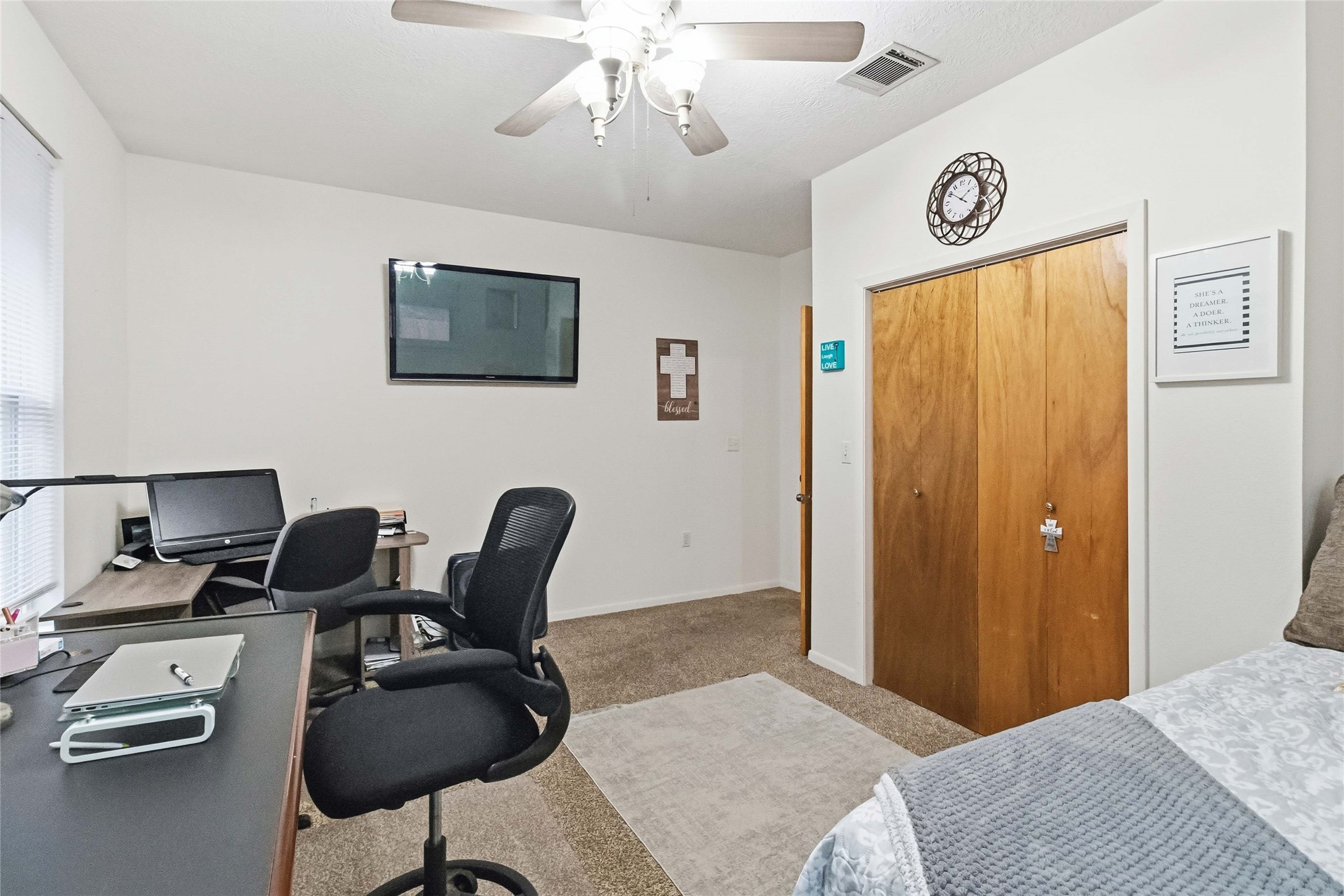 581 State Highway 95 Elgin, TX 78621 - Photo 11 of 30 a bedroom with furniture and a window