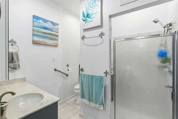 a bathroom with a sink and a shower