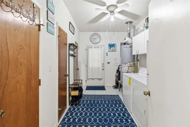a view of a house with a yard and garage