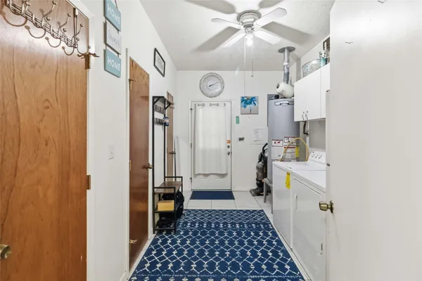 a view of a hallway with a white walls