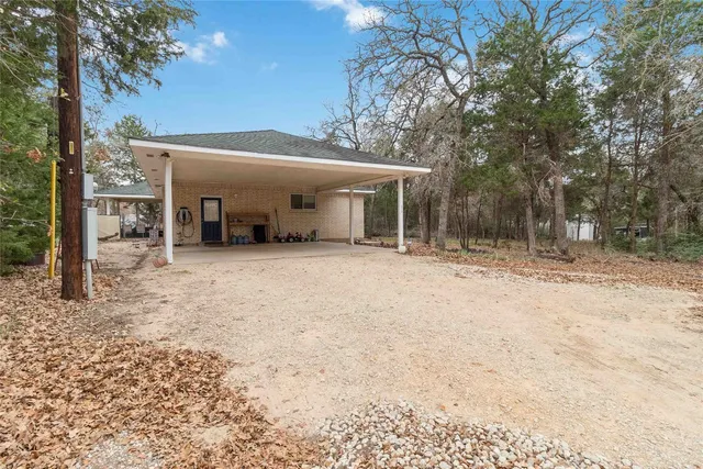 a backyard of a house with lots of green space
