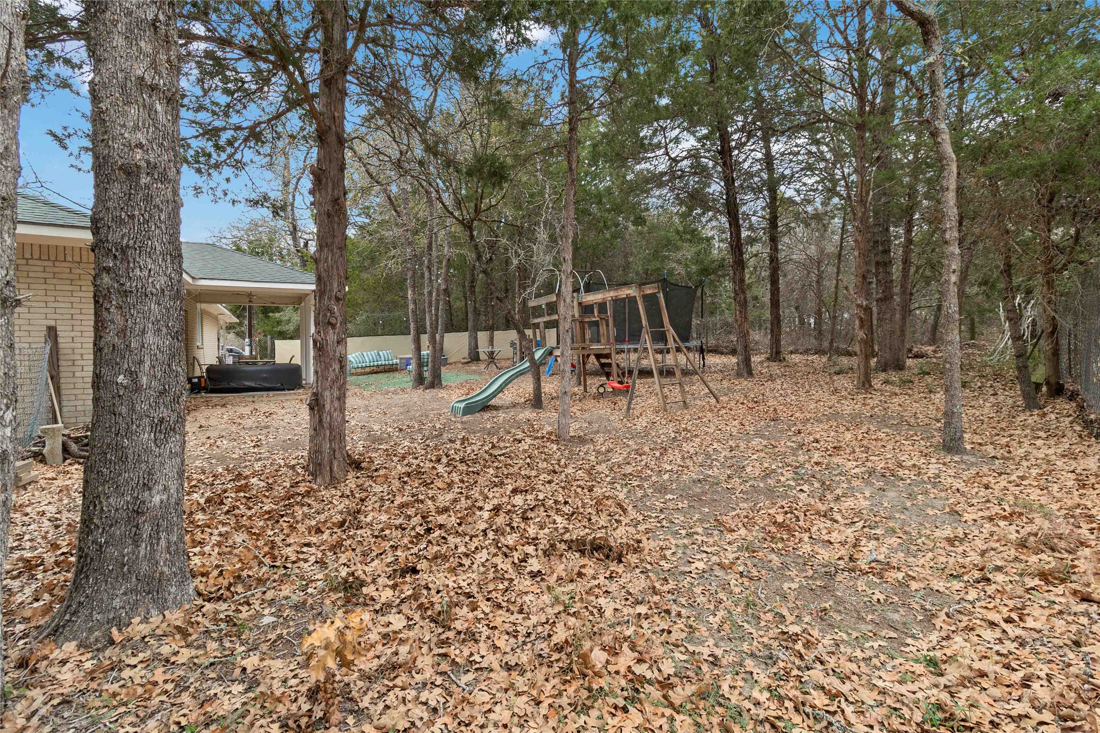 581 State Highway 95 Elgin, TX 78621 - Photo 29 of 30 a backyard of a house with barbeque oven