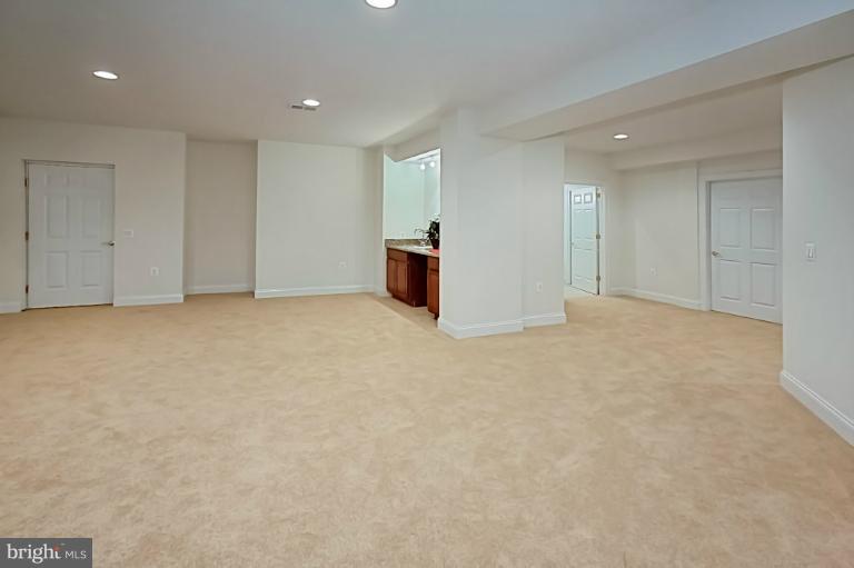 7003 Springville Court Springfield, VA 22150 - Photo 15 of 30 Open Lower Level Media/Rec Room