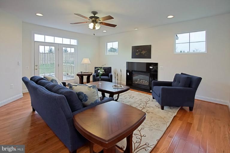 7003 Springville Court Springfield, VA 22150 - Photo 16 of 30 Main level Family room With Gas Fireplace
