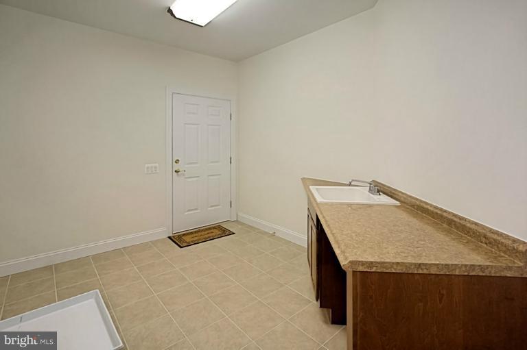 7003 Springville Court Springfield, VA 22150 - Photo 18 of 30 Main Level Mud/Laundry Room Off Garage