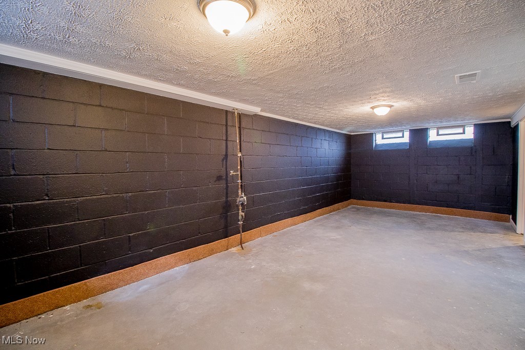 23640 Hartland Road Euclid, OH 44123 - Photo 24 of 28 The basement walls and ceiling have recently been painted. Buyer did not have time to finish painting the floor