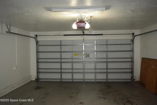 a view of a glass door and the balcony