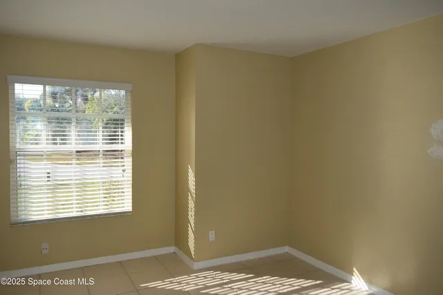 a view of a hallway with closet area