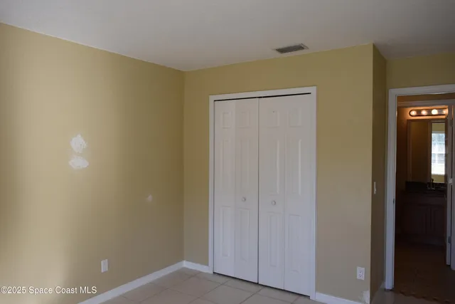 an empty room with a empty space and a window