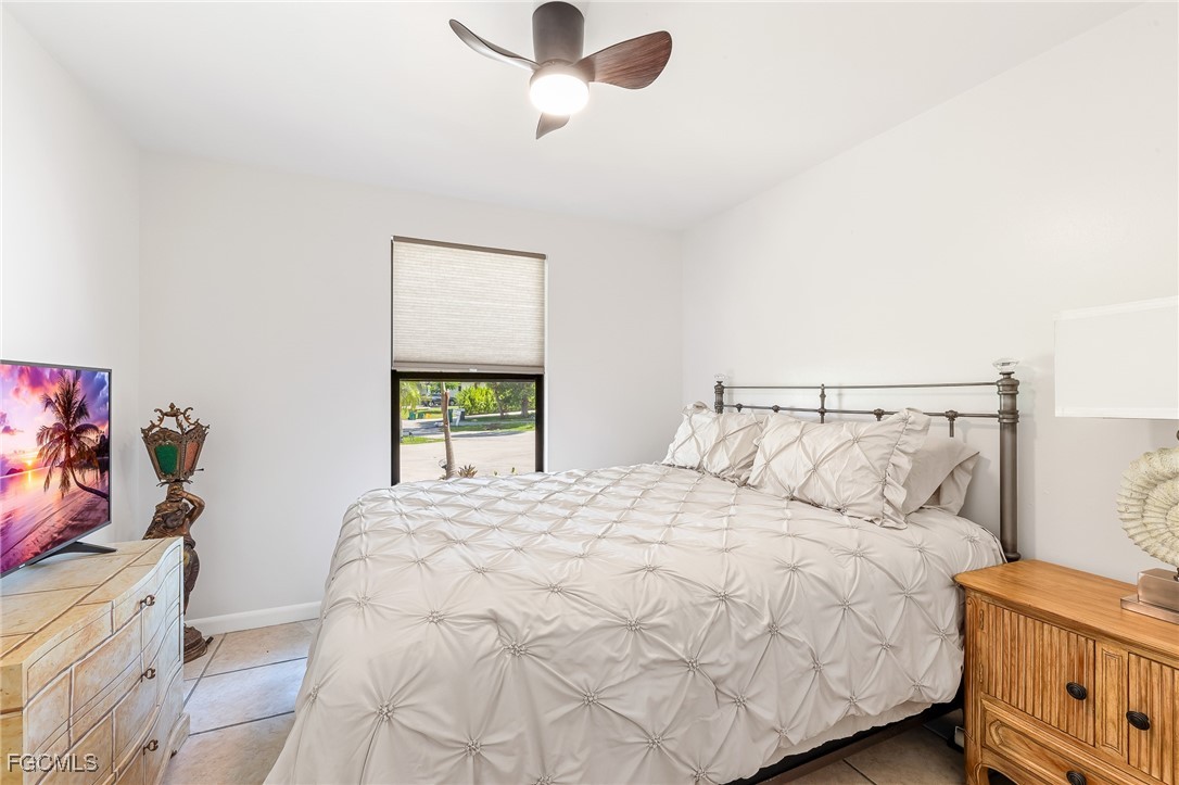 170 5th Street South Naples, FL 34113 - Photo 12 of 23 a bedroom with a bed and a window