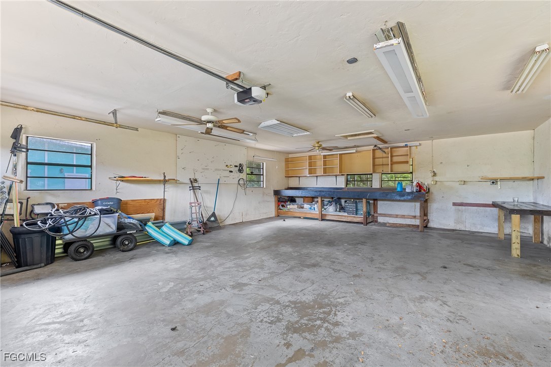 170 5th Street South Naples, FL 34113 - Photo 17 of 23 a big room with furniture and a window