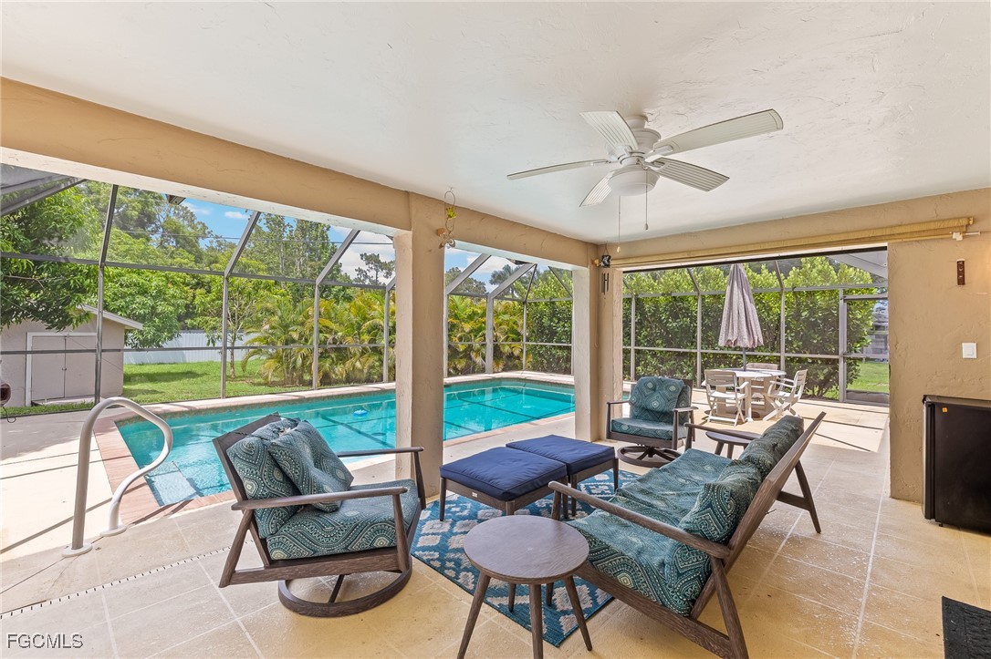 170 5th Street South Naples, FL 34113 - Photo 18 of 23 a living room with furniture and a large window