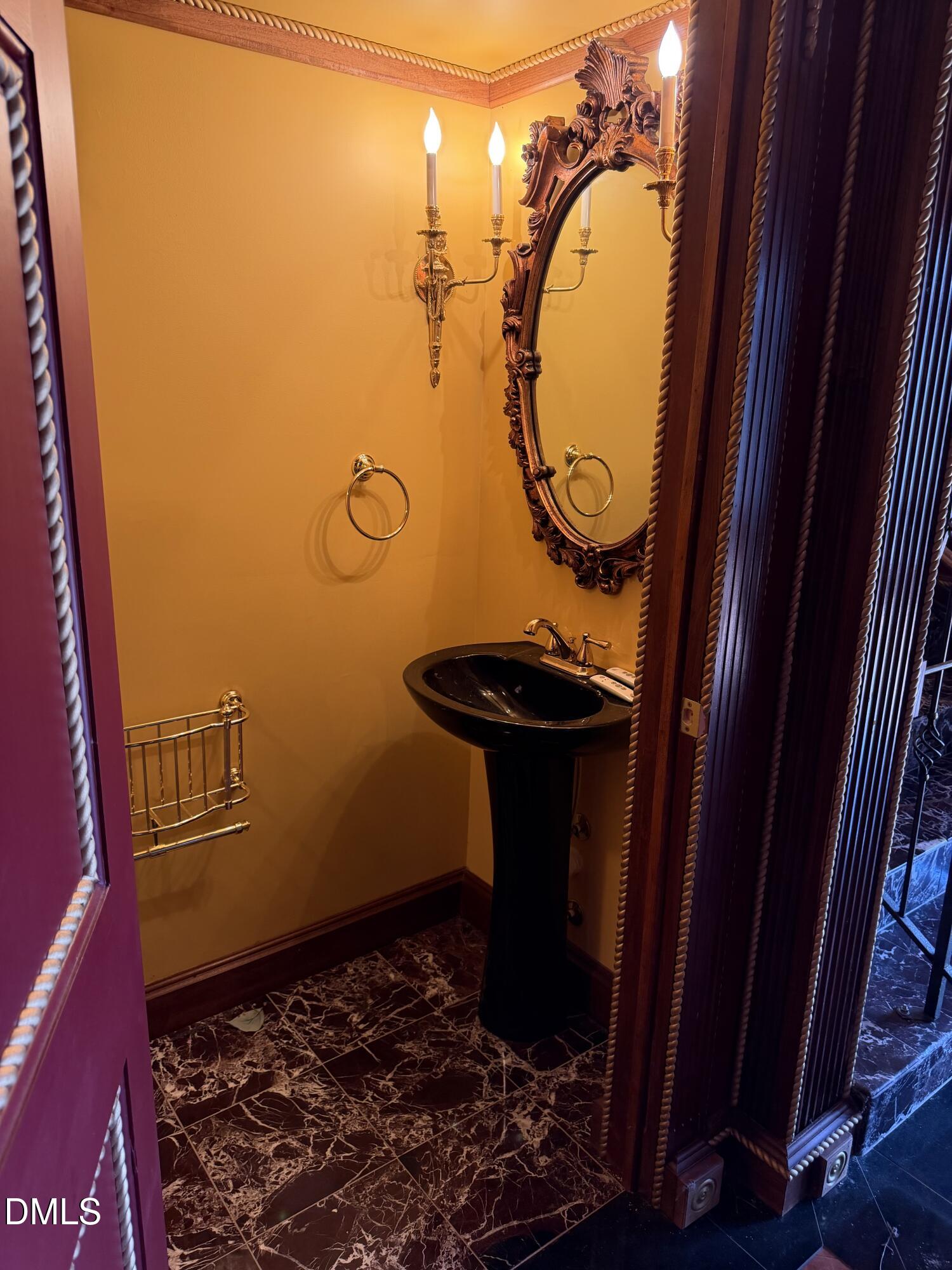 173 Park Circle Faison, NC 28341 - Photo 13 of 56 a bathroom with a toilet and a mirror