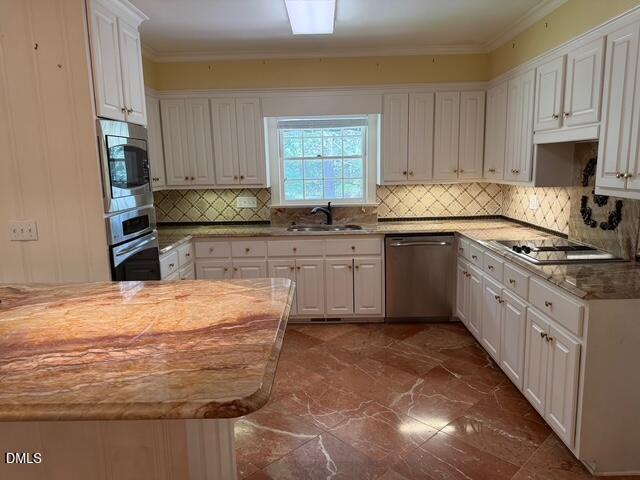 173 Park Circle Faison, NC 28341 - Photo 17 of 56 a kitchen with stainless steel appliances granite countertop a stove a sink dishwasher and a refrigerator